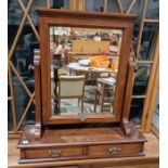 Late 19th/early 20th century mahogany dressing table swing mirror raised over two short drawers,