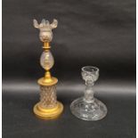 Georgian-style cut-glass and gilt-metal mounted candlestick and a baluster cut-glass candlestick,