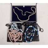 Graduated cultured pearl necklace and three strings of modern pearls to include pink and blue