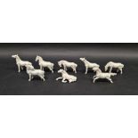 Eight 20th century blanc-de-chine style miniature models of horses in the Tang style, slip cast