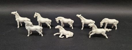 Eight 20th century blanc-de-chine style miniature models of horses in the Tang style, slip cast