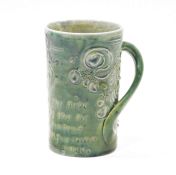 A CH Brannam Art Pottery Victorian Jubilee green-glazed mug, incised CH Brannam/Barum, TB, dated