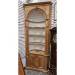 Pine floor standing corner cupboard with round arch cream painted interior, three shaped shelves