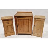 Pine storage cupboard, with single door containing two fitted shelves, measuring approximately