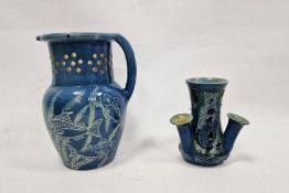 C H Brannam Art Pottery Barum blue-ground triple spill vase and a Lauder Barum pottery blue-glazed