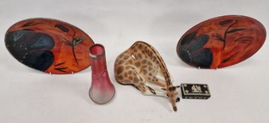 Two Poole Pottery Himalayan Poppy pattern dishes, a Russian porcelain model of a giraffe, a silver-