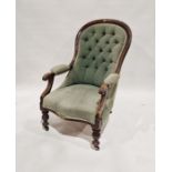 19th century stained wooden button back armchair with upholstered seat and back, on turned legs,