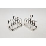 Two silver toast racks, the first with ball feet, hallmarked Sheffield 1912, maker's marks for