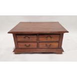 Modern stained hardwood coffee/centre table of rectangular form with four short drawers to two
