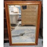 Mahogany framed wall mirror of rectangular form with gilt border, 83cm high x 57cm wide