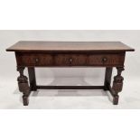 Early 20th century oak serving table in the Elizabethan Revival-style, with three frieze drawers