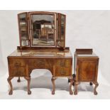 Early 20th century mahogany veneer dressing table with three section folding bevel edged mirror over
