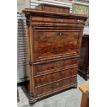 19th century mahogany escritoire having raised box top with single drawer, ogee mould frieze drawer,