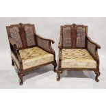 Pair of early 20th century walnut bergere armchairs each with scallop shell motif to the top rail,