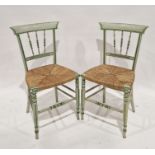 Pair of green and cream painted rush seated chairs with spindle backs and stretchers