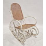 White painted bentwood rocking armchair with cane back and seat