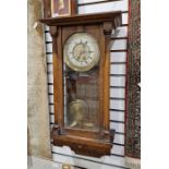 Vienna regulator-style wall clock in stained oak case, roman numerals on enamel chapter ring, 77cm