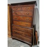 A Georgian mahogany chest on chest, having two short over six long drawers, with later brass handles