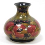 Moorcroft Pomegranate pattern globular vase, impressed marks and green signature to base, with