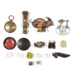 Embossed brass seal handle and a quantity of various intaglio carved 19th century seals, a tape