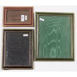 Three Asprey gilt tooled leather photograph frames, variously red, black and green (3)