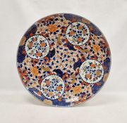 Large Japanese Meiji period (1868-1912) imari charger, printed, painted and gilt with four