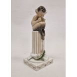 Royal Copenhagen figure of a faun with lizard on a fluted column, printed and painted blue and green