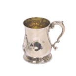 George III silver baluster tankard with double scroll handle, embossed with a centre and engraved