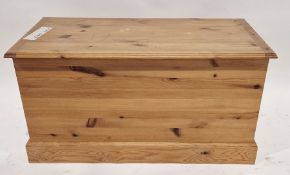 Modern pine blanket box of rectangular form, with twin brass handles, approximately 48cm high x 91cm