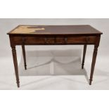 Late 19th/early 20th century desk of rectangular form, with two short drawers to the front, raised