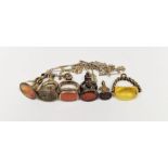 Antique gold-plated seal fob set with cornelian, two others with intaglio cameo carving, another