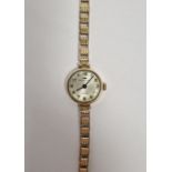 Vintage Jacquet-Droz 9ct gold lady's wristwatch, the circular dial having Arabic numerals denoting