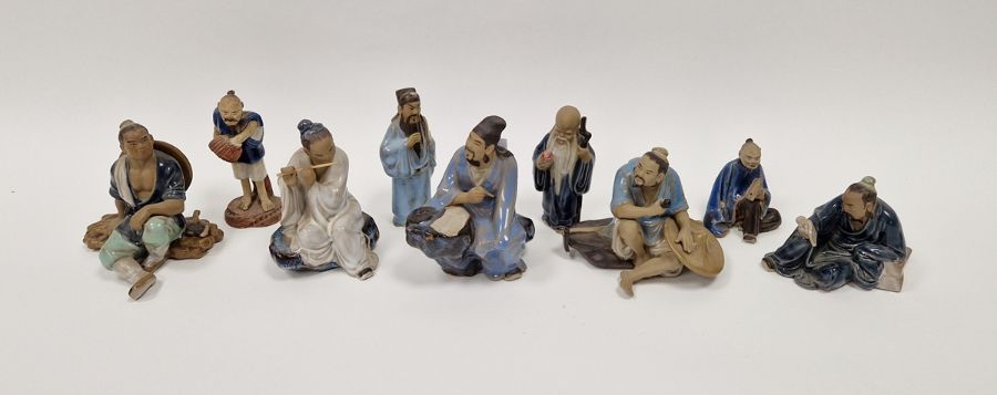 Nine Chinese Shiwan mudman-type figures of musicians, tradesmen, an immortal and others, various