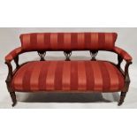 Victorian mahogany two-seat sofa with upholstered seat, back and arms on front turned legs with
