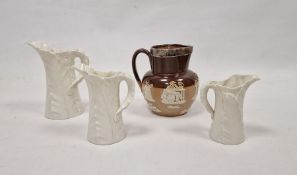 Doulton Lambeth silver-mounted brown stoneware Harvest jug and three Royal Worcester leaf-shaped