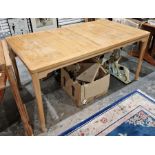 Garsnas, Sweden, lightwood extending dining table, rectangular, on turned supports, having two