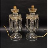 Pair of Victorian cut-glass lustres adapted as table lamps, each double-tiered lustre with cut spire