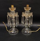 Pair of Victorian cut-glass lustres adapted as table lamps, each double-tiered lustre with cut spire