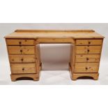 Modern pine dressing table by Ducal, each pedestal having four short drawers, with separate dressing