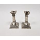 Pair of Edwardian silver dwarf table candlesticks, each with removable sconce, stop fluted column