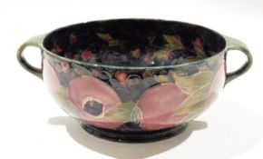 Moorcroft Pomegranate pattern two-handled bowl, impressed marks and green signature to base,