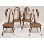 Set of four Ercol-style dining chairs comprising three standard and one carver with spindle backs,