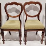 Pair of Victorian mahogany dining chairs, with drop-out seats raised on turned front legs, 85cm