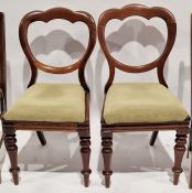 Pair of Victorian mahogany dining chairs, with drop-out seats raised on turned front legs, 85cm