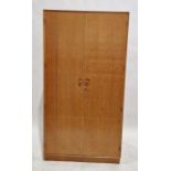 Mid century Meredew oak two door wardrobe, measuring approximately 176cm high by 92cm wide by 53cm