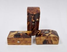 Two 19th century tortoiseshell miniature boxes in the form of tea caddies, rectangular and dome, and