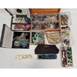 Quantity of costume jewellery, beads, compacts, vintage bags, two strings of faceted amber-