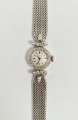 Mid-century lady's 9ct white gold and diamond set Movado cocktail wristwatch, the circular dial