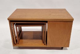 McIntosh teak Tristor Range metamorphic coffee table, c.1970's, the swivel turnover top above drop-