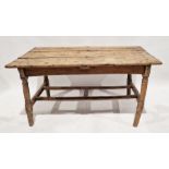 Antique pine dining table of rectangular form, raised on turned legs, 70cm high x 136cm wide x